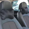 1 pair of black headrests