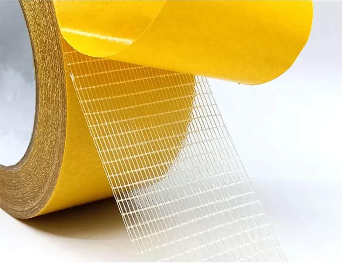 Double Sided Transparent Cross Filament Tape With Yellow Release Paper 