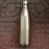 Bouteille de Coca, or brillant 750ML.