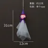 Sombrero de bruja morado con pequeño fantasma brillante