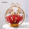 Cesta de flores de bayas rojas