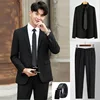 Abito nero-pantaloni neri-camicia nera-cintura in pelle