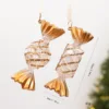 2 caramelos dorados