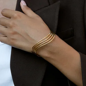 MW Minimalist 18K Gold-Plated Stainless Steel Bangle: 3-Layer Hollow Wave Design with Trendy Classic Lines