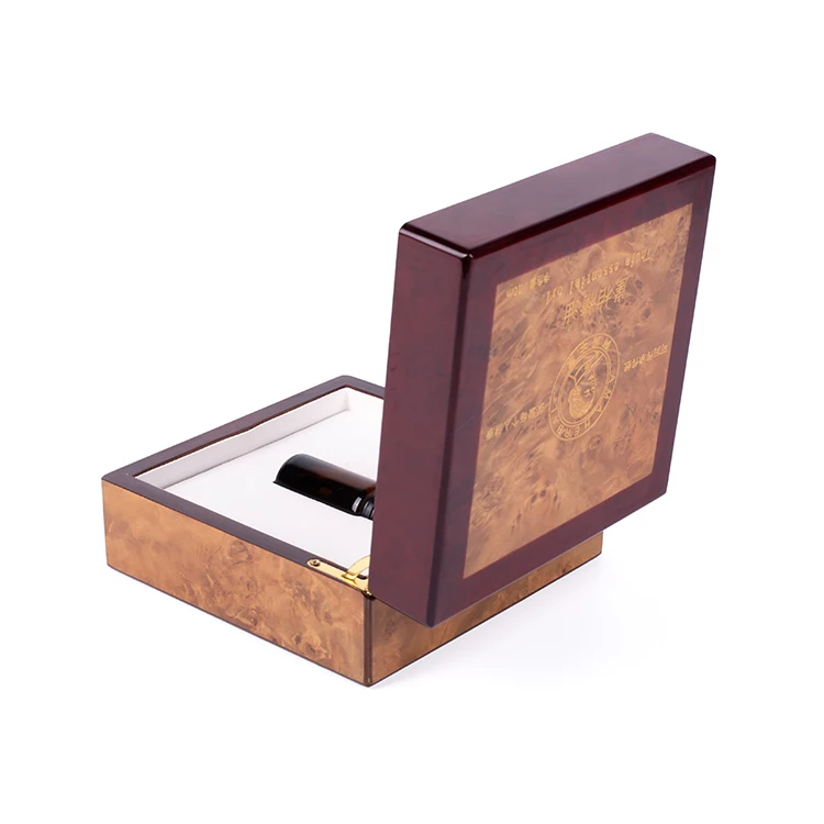 Open box with dark bottle