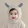 Cucciolo con ricamo binaurale - bianco sporco