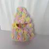 Tocado de árbol de Navidad de color arcoíris con embrión blanco