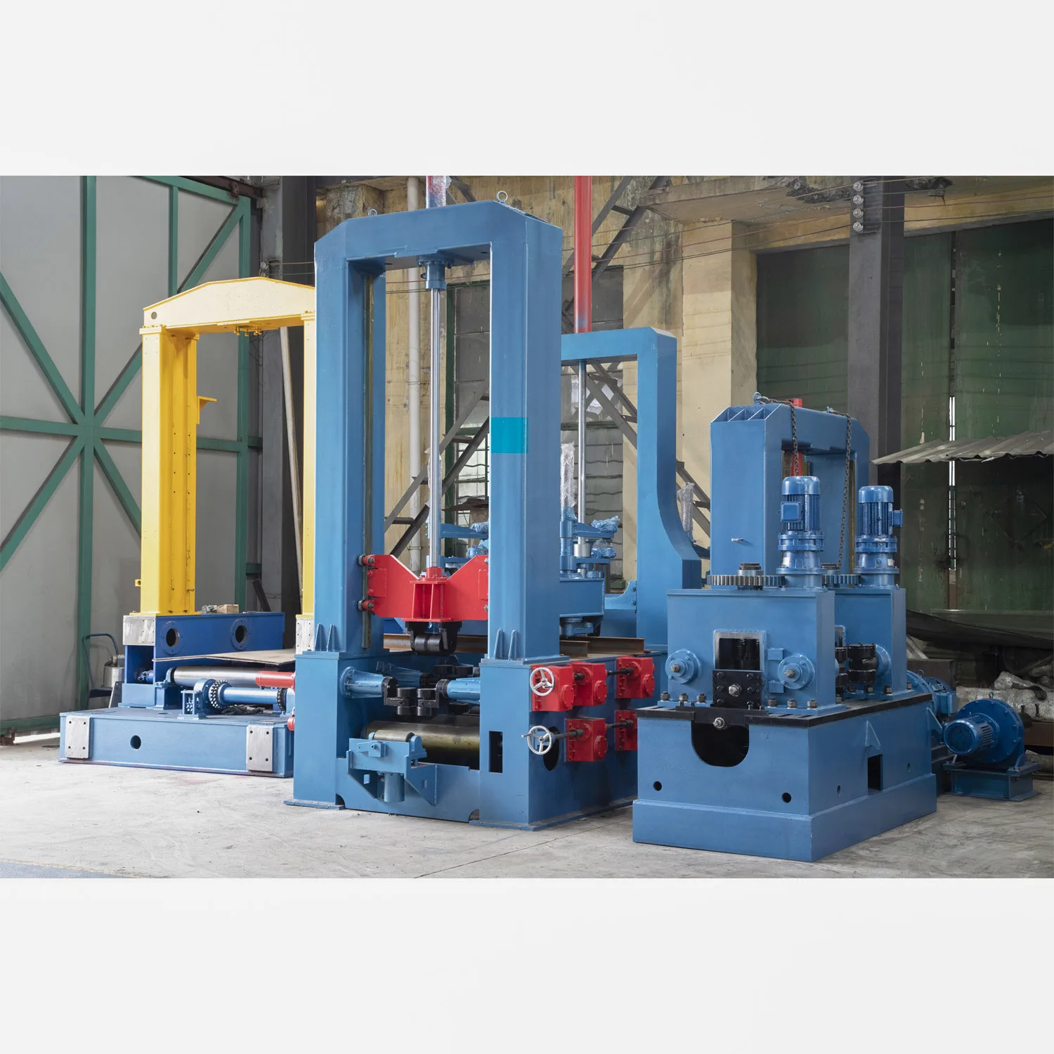 Flange straightening machine for H-beam production lines