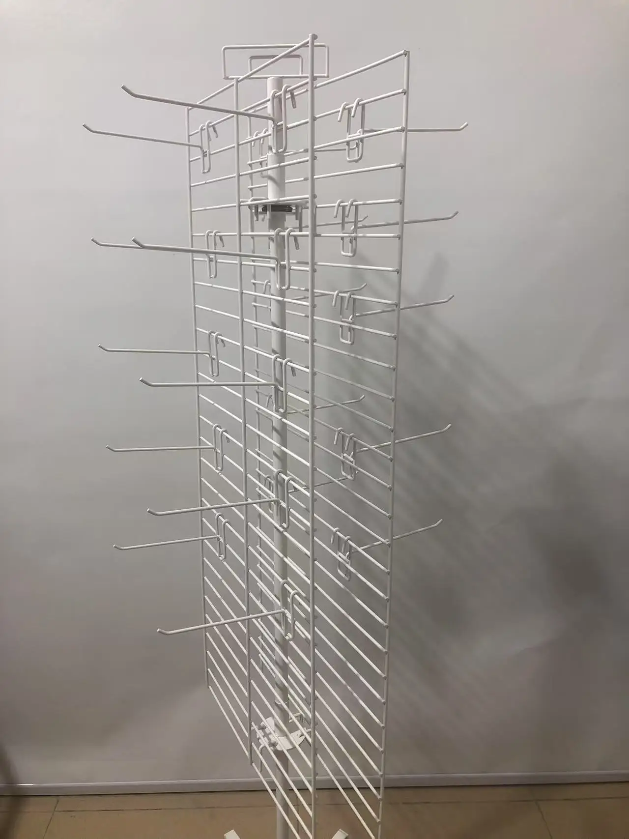 Double-side Iron Net Display Racks 360 Degree Rotation Metal Grid Gadget Display Stand with Removable Hooks and Caster