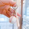 Grosse balle de baseball blanche de 3,5 cm avec batte de 7,5 cm.