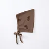 brown hat