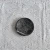 Diámetro 10, altura 2 cm, mármol gris.