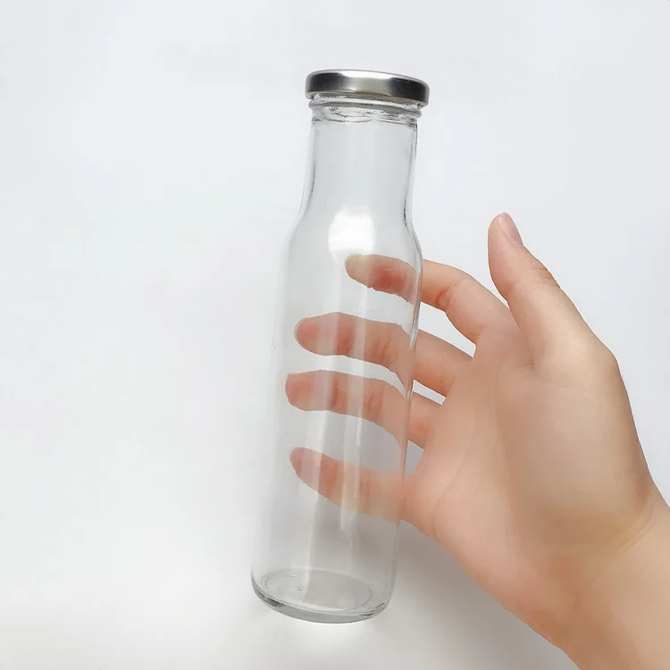 Wholesale 250ml Transparent Glass Bottle for for Cold Press Juice Ketchup with Metal Cover