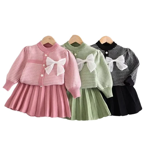 2023 Girls Designer New Solid Sweater Plaid Pleated Skirt Autumn Winter Bow Knitting Two Pieces Long Bubble Sleeves Kids Wear
