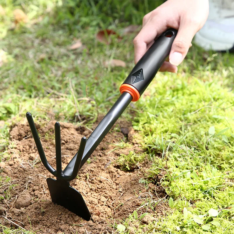 Herramientas de jardinería Mango de plástico negro Rociador de plástico de dos cabezas Azada de doble uso Rastrillo de cinco dientes Pala para flores al aire libre