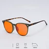 Olive green with orange lens