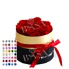 7 roses in gold box