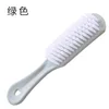 Green shoe brush