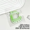Console de jeu Green Love - mousqueton en acrylique (sac opp)