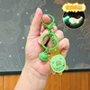 Portachiavi luminoso a forma di piccola tartaruga cartoon - rana verde