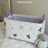 Orso beige con fiore (taglia grande)