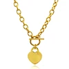 Gold heart charm