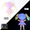 colorful glow-in-the-dark double ponytail girl