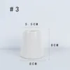 3 cylindrical bottles