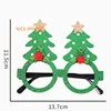 Gafas verdes con diseño de árbol de Navidad pentagrama.