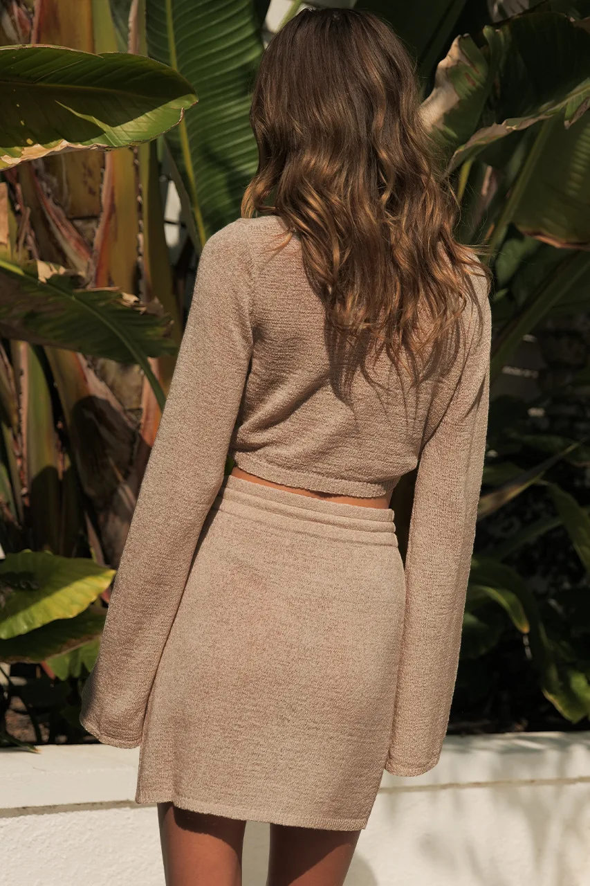 Manufacturer Autumn hot selling weave two pieces set  long trumpet sleeves tangle up deep-V collar solid crop top and mini skirt