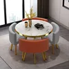 Mesa blanca + silla naranja/gris/dorada