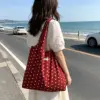 Gilet rosso a pois