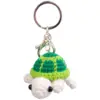 Green turtle knitted pendant