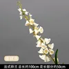 Champagne-colored French lily of the valley branch