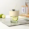 Bamboo-shaped cup, transparent and white, with lid and straw