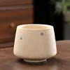 Tazza generale color caffè a piccoli pois