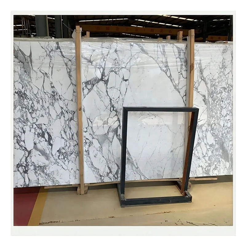 رخام أرابيسكاتو كورشيا للديكور الجداري، رخام بيانيكو ستاتواريو فيناتو الغريب، رخام أبيض مطابَق من الكتابة (Book Matched)