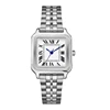 montre argentée et blanche
