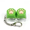 2 clés silicone patte de chat vert