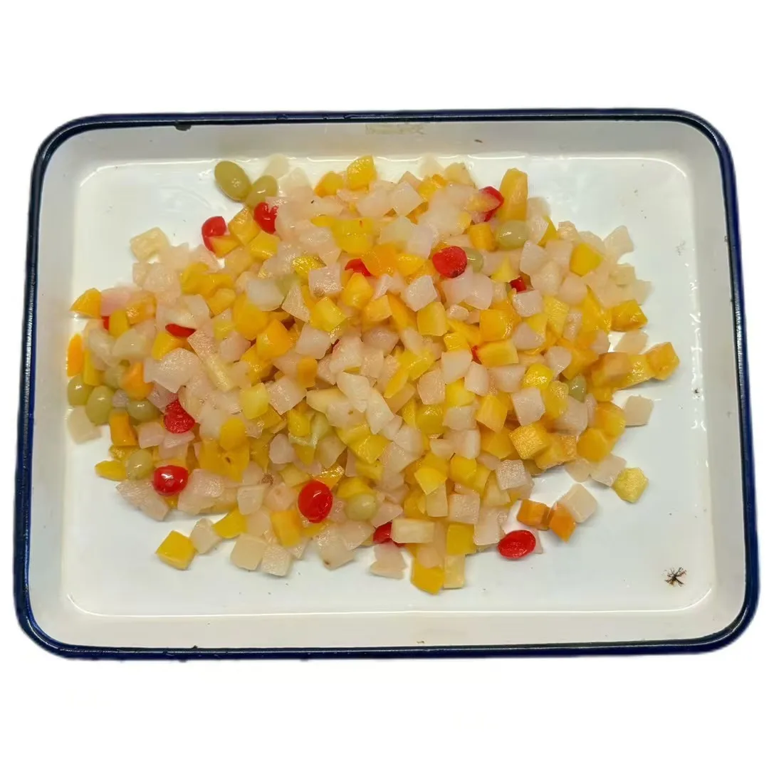 Fresh and High-quality Fruit Cocktail Jar Is Crafted From Tropical Fruits and Features Canned Fruits Soaked in Syrup.