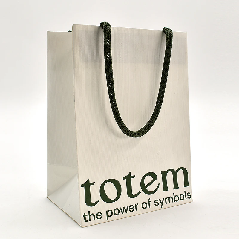 Customized Luxury Premium Gift Bag with Exquisite Embossing Sponge Lining UV Coating Matt Lamination