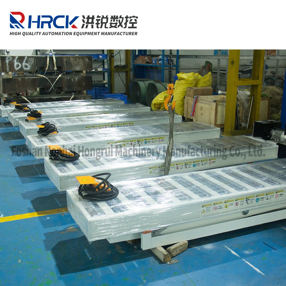 Hongrui Reasonable Price 3 Tons Hydraulic Lift Tables with Powered Roller Surface OEM with CE Certificate