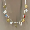 Collier fini poivre d'étoile de mer