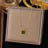 ah36-square black shell necklace gold