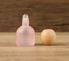 Tapa de madera rosa de 10 ml, sin logo.
