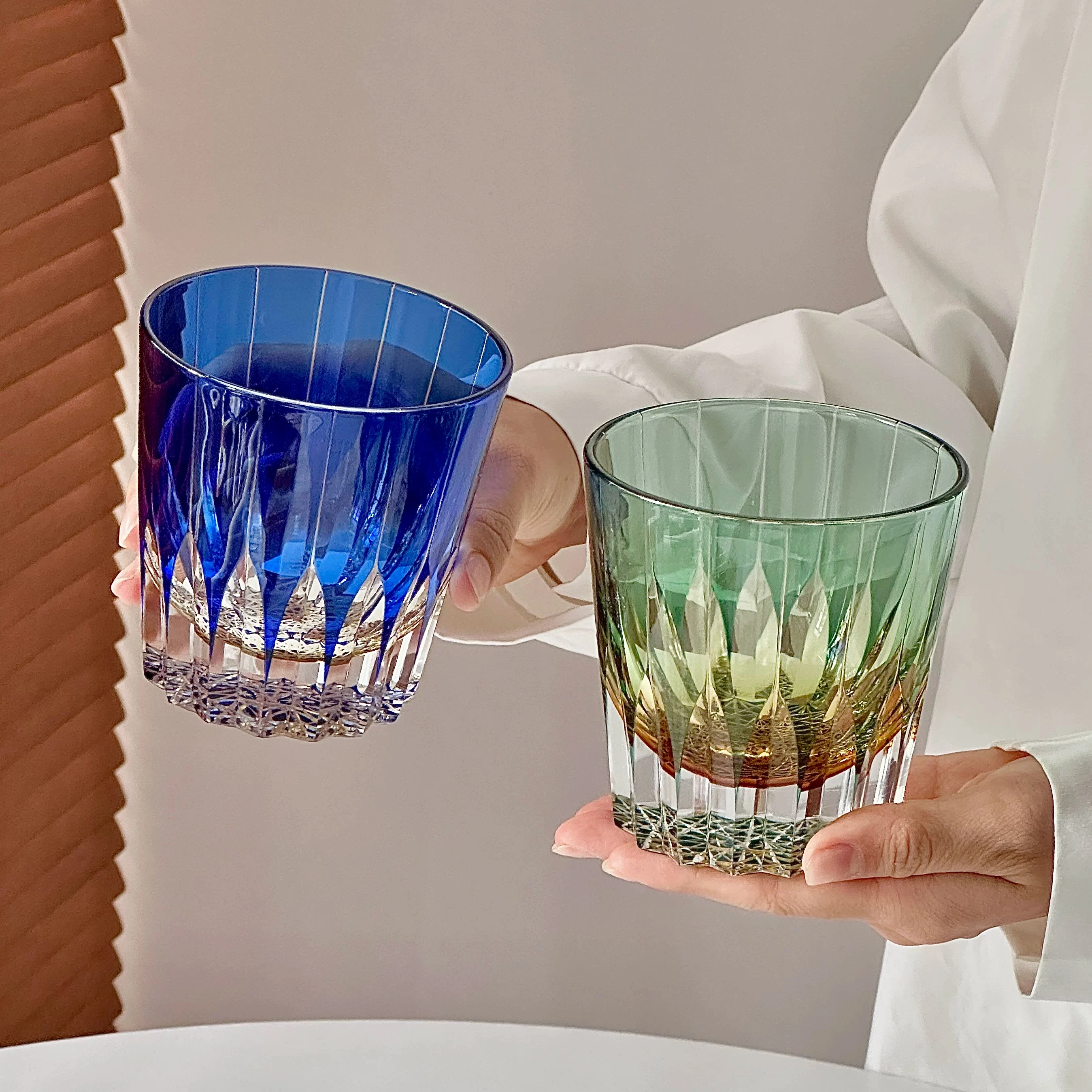 Two rocks tumblers with faceted bowl patterns