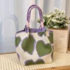 Hkb9075 design con sfondo viola-verde e cuore