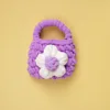 White flowers-purple bag-white flowers