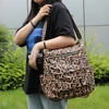 brown leopard with leather strap