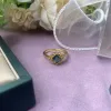 green moissanite inlaid ring